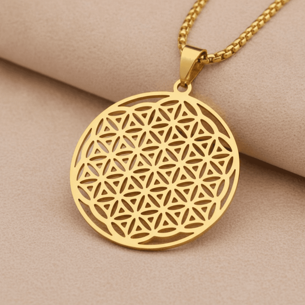 Gold Flower of Life pendant necklace with sacred geometry cutout design on box chain